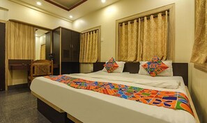 Deluxe Room | Egyptian cotton sheets, premium bedding, in-room safe, desk - Fabexpress Shivalya (Barasat)