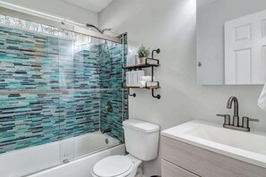 Shower, hair dryer, shampoo