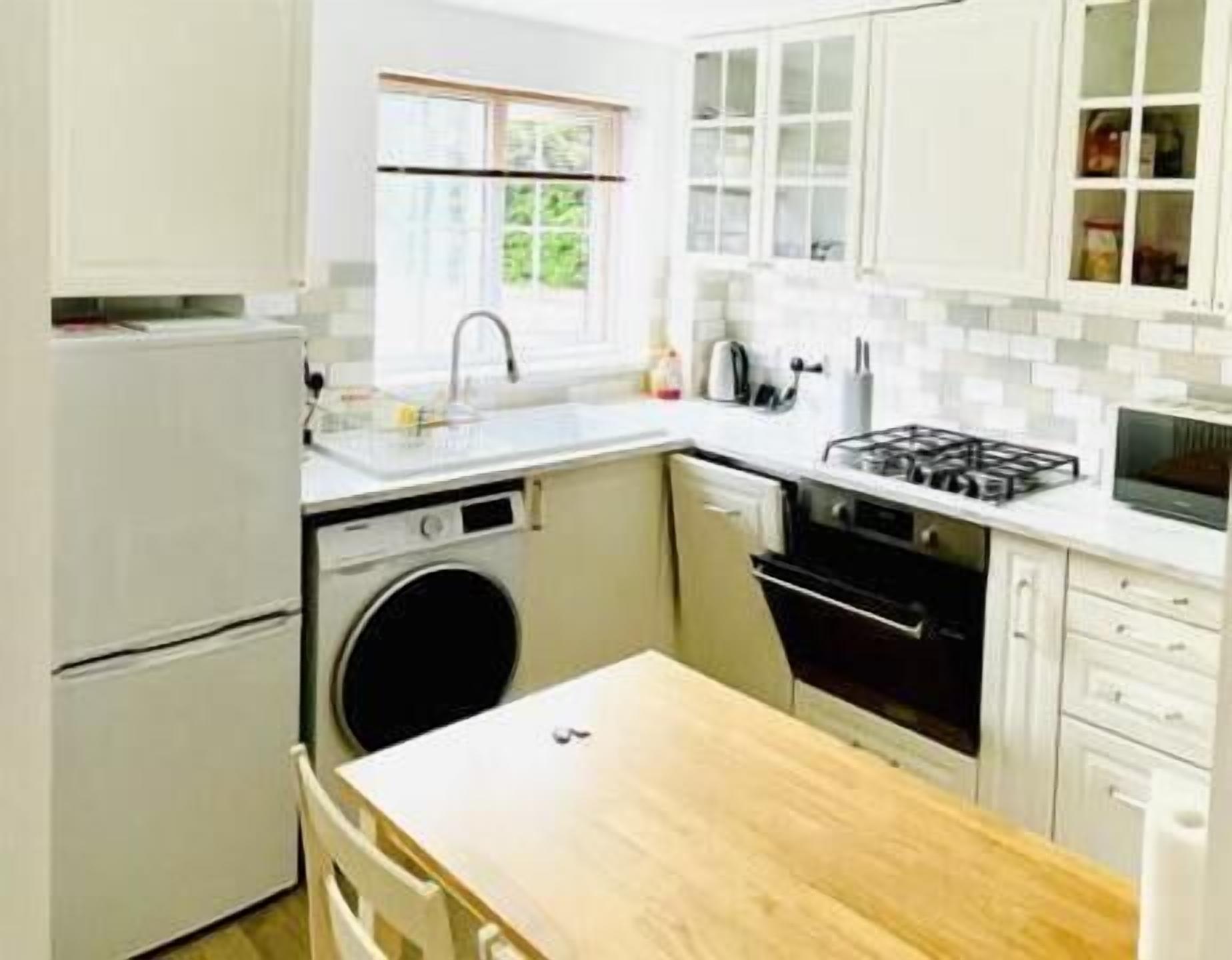 Villa | Private kitchen | Fridge, microwave, oven, stovetop