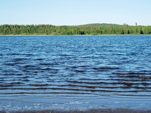 A calm lake with a forested shoreline. - 4 Star Holiday Home in Nassjo (Nassjo)