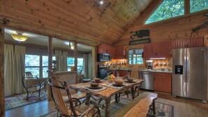 Unclassified image, 2 of 28, button - Laughing Waters- nestled along Fighting Town Creek, offering pet-friendly bliss with a hot tub, firepit, larege screened porch and excellent fishing. WiFi (Cherry Log)
