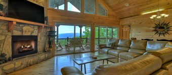 Hummingbird Haven is the ultimate retreat for large groups! Enjoy pet-friendly accommodations, breathtaking mountain views, a hot tub, firepit, WiFi, and hiking