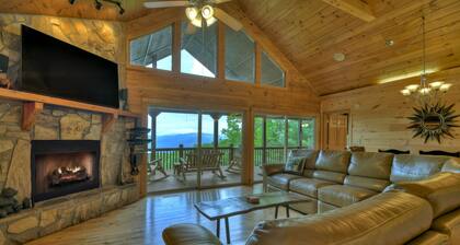 Hummingbird Haven is the ultimate retreat for large groups! Enjoy pet-friendly accommodations, breathtaking mountain views, a hot tub, firepit, WiFi, and hiking