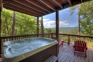 Outdoor spa tub - Mountainview Getaway is a Pet-friendly haven featuring breathtaking views, hot tub, firepit, spacious screened porch, cabin-side hiking, and reliable WiFi (Blue Ridge)