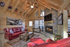 TV, fireplace - Up, Up and Away is pet friendly with a beautiful mountain view, hot tub, firepit, WiFi and fenced yard (Blue Ridge)