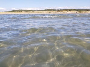 A beach with clear water and a distant shoreline. - 3 Person Holiday Home in Falkenberg (Falkenberg)