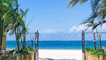 On the beach, white sand