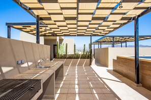 Terrace/patio - Sea Esta is a ground-floor 2-BD, 2-BR condo within walking distance of downtown Cabo, the marina, and Cannery Beach. Featuring an open-concept living space, private balcony, and views of the city and the Sea of Cortez, it’s ideal for a relaxing Cabo. (Cabo San Lucas)