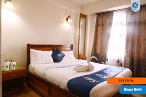 Desk, laptop workspace, free WiFi, bed sheets