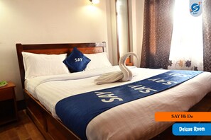 Desk, laptop workspace, free WiFi, bed sheets