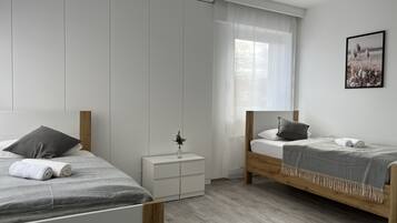 4 bedrooms, desk, iron/ironing board, travel cot