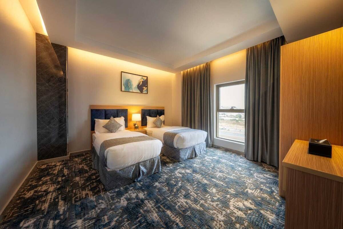Suite familiar | 1 dormitorio, sábanas de algodón egipcio, ropa de cama de alta calidad