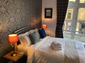 1 chambre, fer et planche à repasser, Wi-Fi, literie fournie