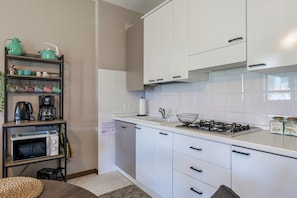 Fridge, microwave, dishwasher, coffee/tea maker