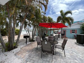 Outdoor dining - NEWLY RENOVATED Beach studio w/ pool view #3 (Treasure Island)