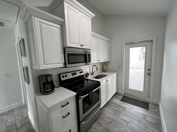 Fridge, microwave, oven, stovetop - Modern bungalow w/ Oceanview #9 (Treasure Island)