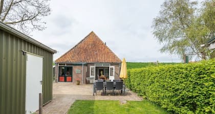 Characteristic farmhouse on the dike