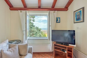 21-inch flat-screen TV with satellite channels, TV - Valdarke Sea View Apartment (Mali Losinj)