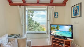 Family Apartment, Multiple Bedrooms (Valdarke Sea View Apartment) | Living area | 21-inch flat-screen TV with satellite channels, TV