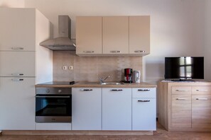 Geladeira, fogão, cooktop, cafeteira/chaleira