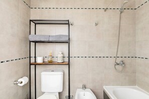 Hair dryer, bidet, towels, soap
