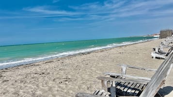 On the beach, white sand
