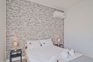 2 slaapkamers, een strijkplank/strijkijzer, gratis wifi, beddengoed