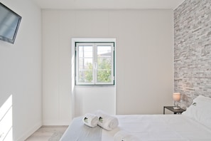 2 slaapkamers, een strijkplank/strijkijzer, gratis wifi, beddengoed