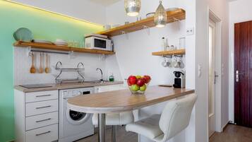 Fridge, microwave, stovetop, coffee/tea maker