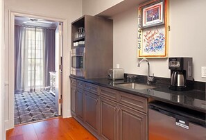 Fridge, microwave, coffee/tea maker, toaster