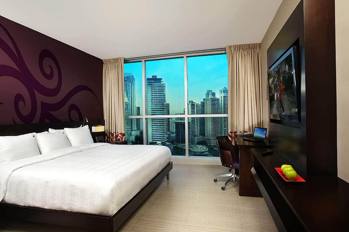 Premium bedding, down comforters, free minibar, in-room safe
