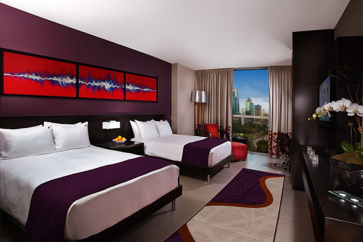 Premium bedding, down comforters, free minibar, in-room safe