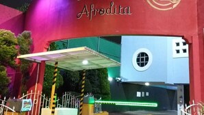 A hotel entrance with a sign reading "HOTEL Afrodita" and a logo above it. - Hotel Afrodita (Mexico City)