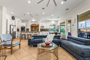 House | Living room | 65-inch Smart TV with satellite channels, TV, fireplace - Luxurious Villa Living in Indio w/ Pool/Spa (Indio)