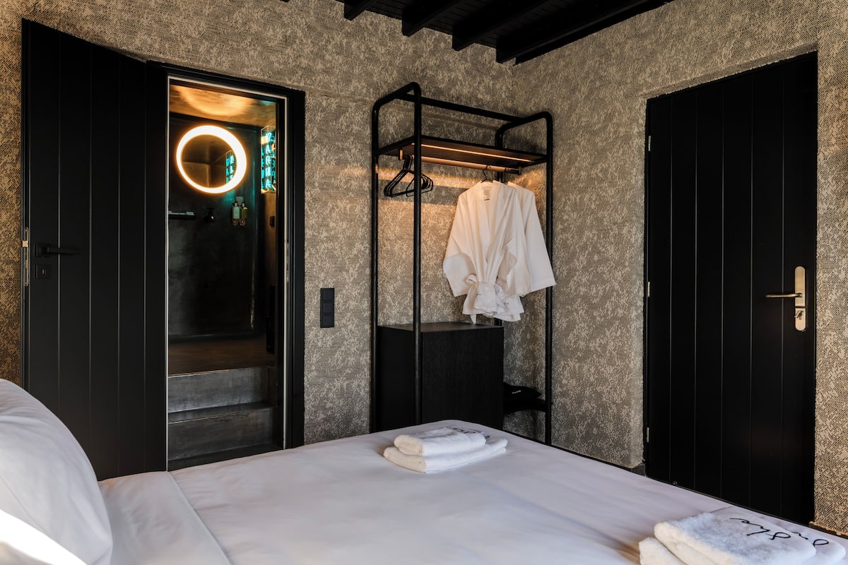 Premium bedding, memory foam beds, free minibar items, laptop workspace