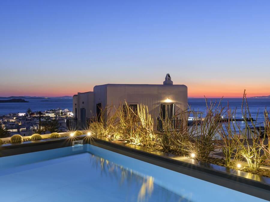 Outdoor pool, open 10:00 AM to 8:00 PM, pool loungers