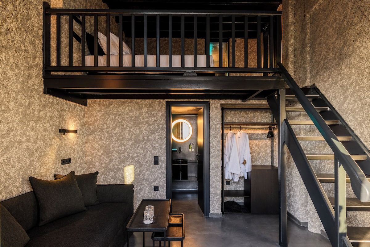 Premium bedding, memory foam beds, free minibar items, laptop workspace