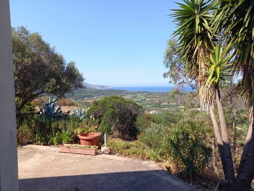 House on hillside with sea view 2 km from the beach.