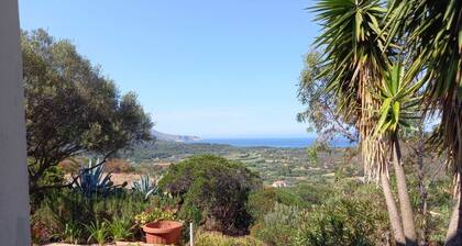 House on hillside with sea view 2 km from the beach.