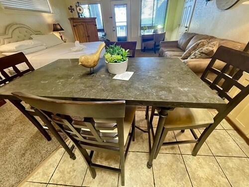 Lake view King Studio with full kitchen, deck overlooking Lake Ouachita, king bed and queen sleeper sofa by RedAwning