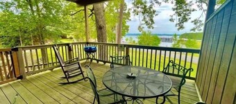 Lake view King Studio with full kitchen, deck overlooking Lake Ouachita, king bed and queen sleeper sofa by RedAwning