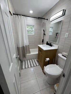 Hair dryer, towels, soap, shampoo