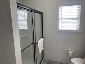 Shower, hair dryer, towels, soap