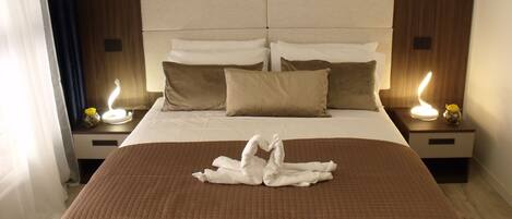 Ropa de cama de alta calidad, camas con efecto memoria y minibar