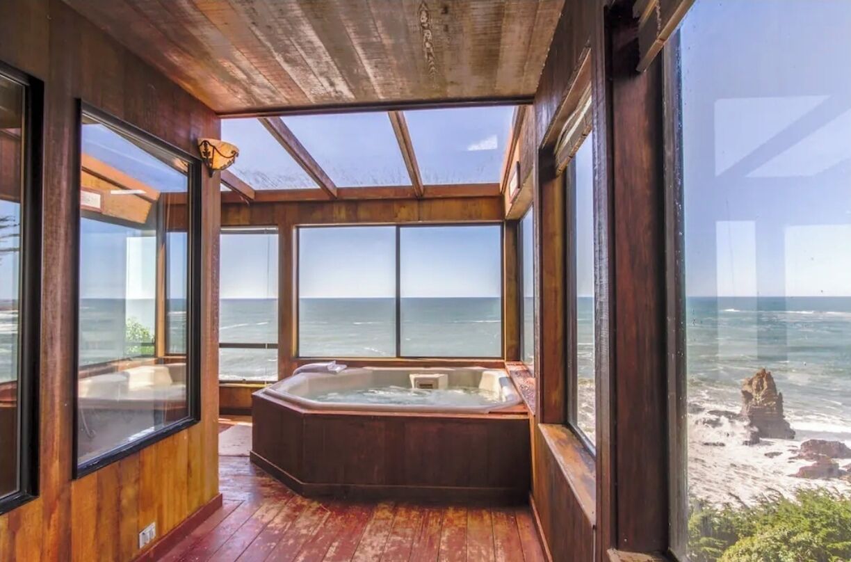watch the waves from this indoor hot tub