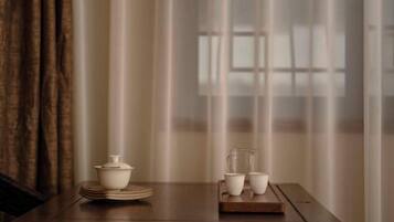 Desk, blackout drapes, bed sheets