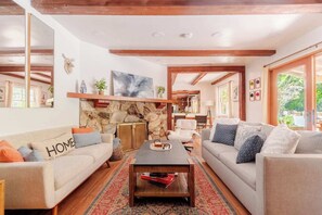 Smart TV, fireplace, video game console, table football