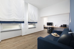 Family Suite, Terrace, City View | Living area | 40-inch flat-screen TV with digital channels, TV - Lidia Rooms & Suites (Sorrento)