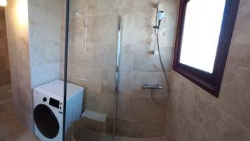 Shower, eco-friendly toiletries, hair dryer, towels