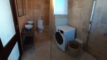 Shower, eco-friendly toiletries, hair dryer, towels